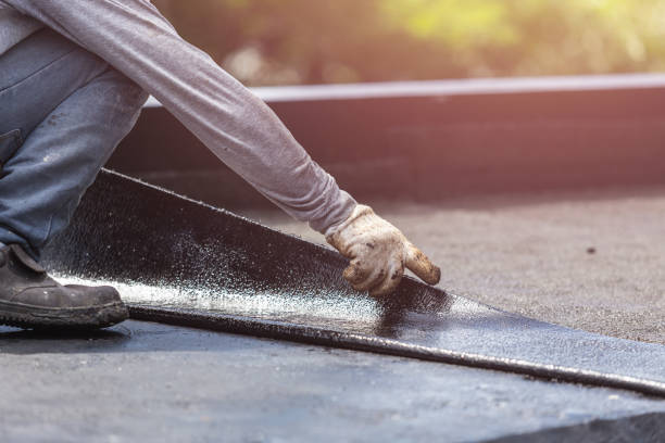 Professional Basement Waterproofing technician working in Etna, OH